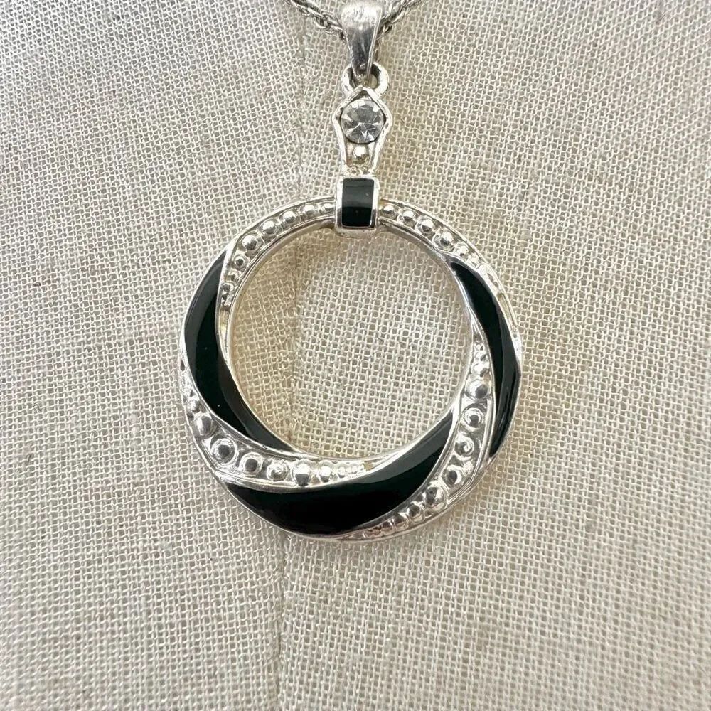 Avon silver tone and black circle pendant necklace